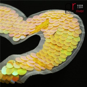 Orangefarbener Paillettenpatch