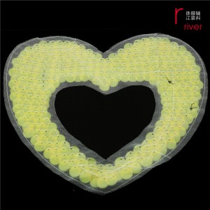 Orangefarbener Paillettenpatch