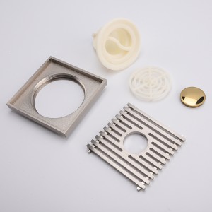 Dekorativer Messingablauf deckt Bodenabläufe ab. Bodenabläufe Badabläufe reinigen