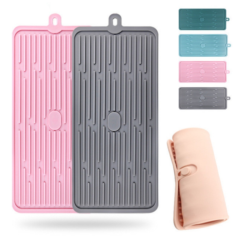 Rechteckiger Knopf zum Halten des Abflusskissens