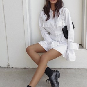 Französisch-weißes Kleid mit Taille und Manschetten und langen Laschen für Frauen 2023 Neue Design Taille und fester Farbe langärmeliger Rock