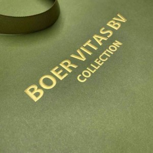 Luxuriöse grüne Sammeltasche