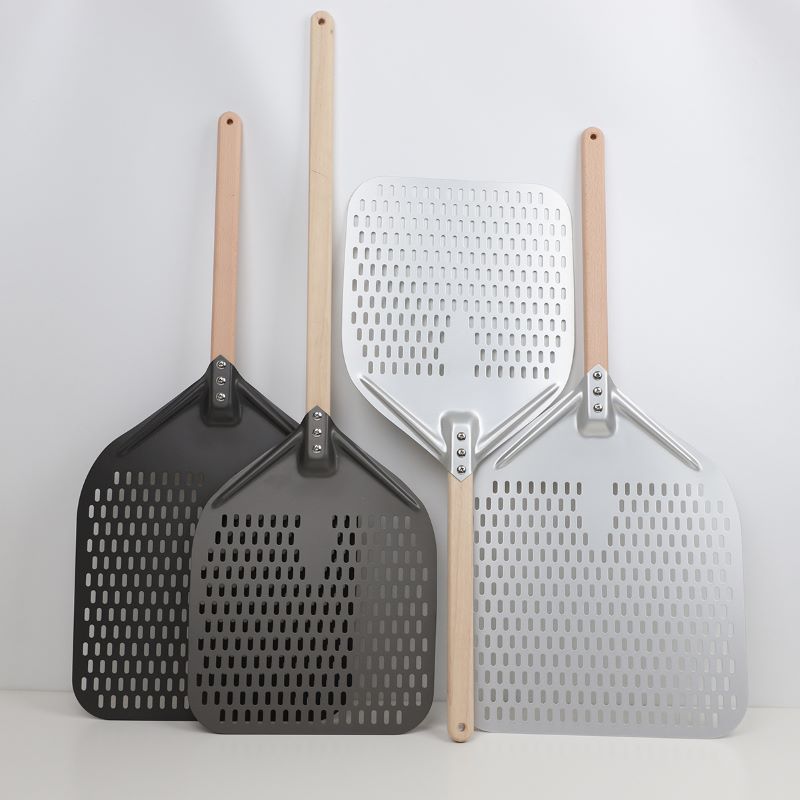 1671502533.jpeg Wood handle perforated pizza shovel.JPEG